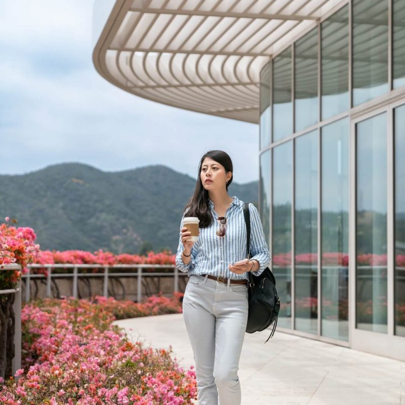 woman-having-coffee-break-at-office-rooftop-1.jpg